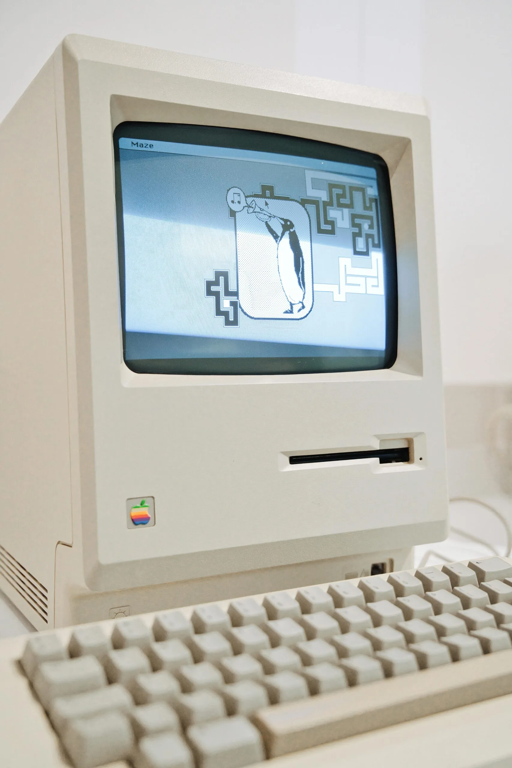 GEO for Baby Brands 12 Classic Macintosh computer displaying a retro game, highlighting vintage tech charm.